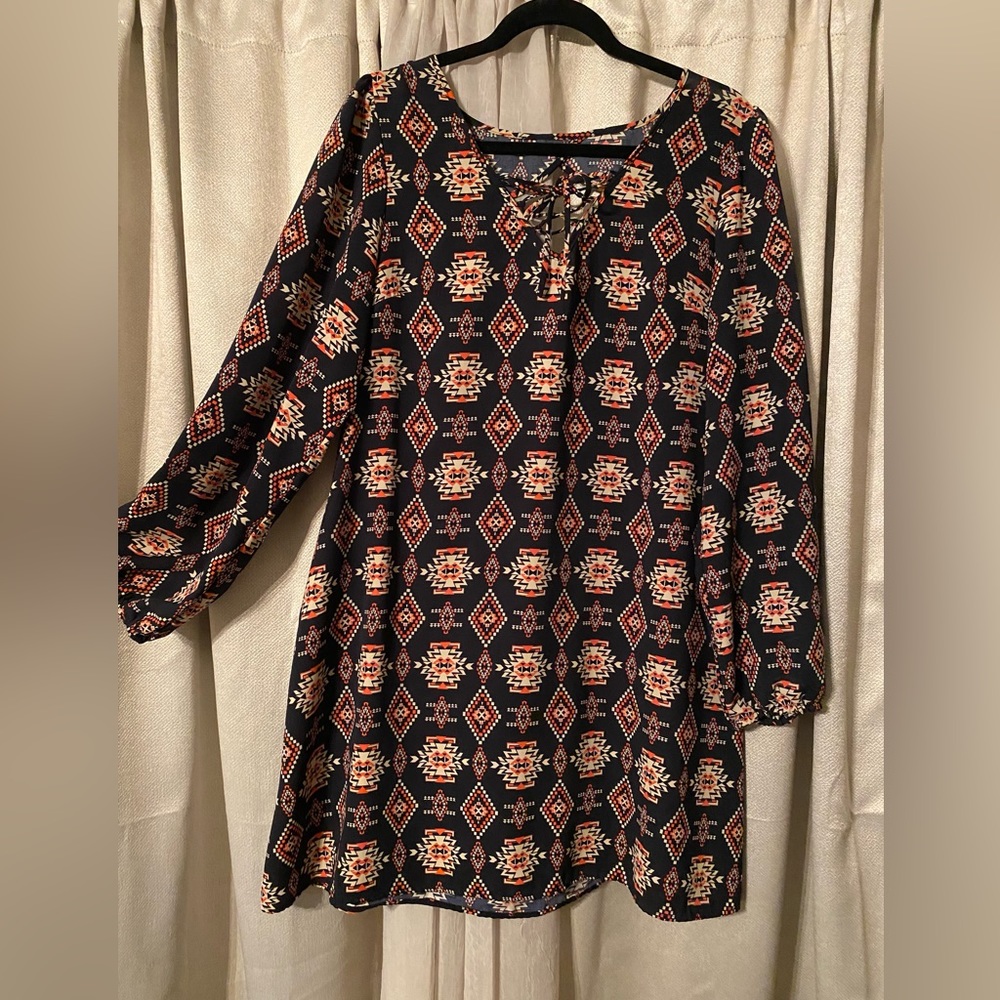 Navy, orange & cream colored Aztec design.